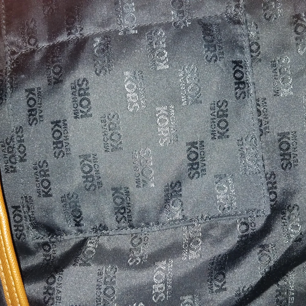 Michael Kors Black and Tan Structured Tote with Gold Hardware - Picture 3 of 16